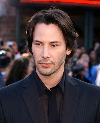 Keanu Reeves, 56, clips his dark locks back with hair slides | Daily Mail  Online